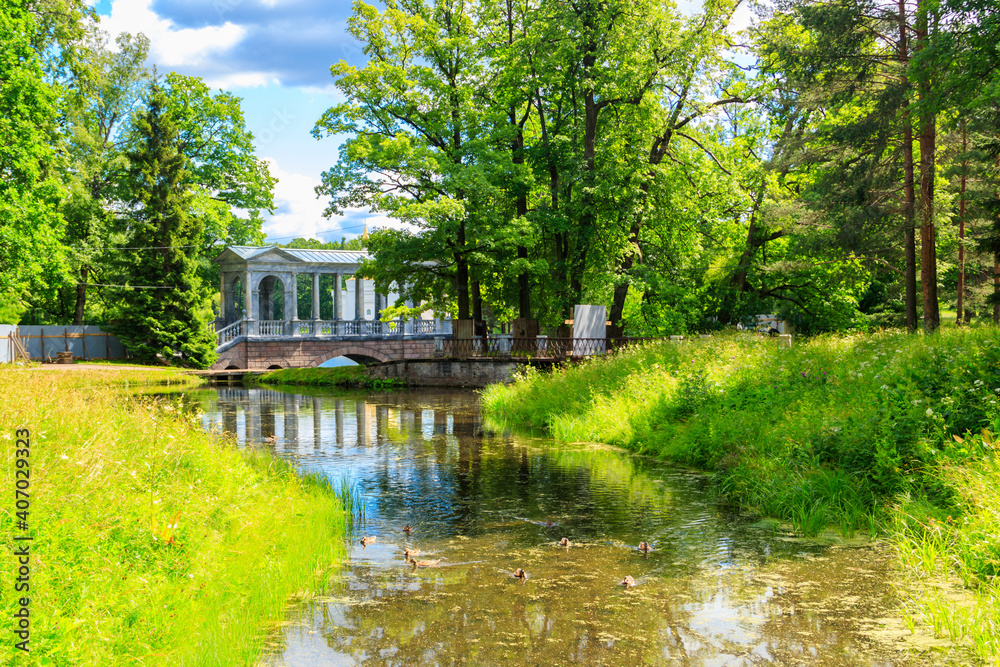 Marble bridge or Siberian Marble Gallery is a decorative pedestrian roofed Palladian bridge (gallery walkway) in Catherine Park in Pushkin (Tsarskoye Selo), Russia Marble bridge or Siberian Marble Gallery is a decorative pedestrian roofed Palladian bridge (gallery walkway) in Catherine Park in Pushkin (Tsarskoye Selo), Russia