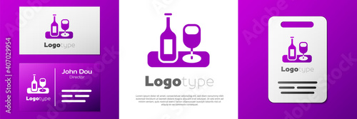 Logotype Wine bottle with glass icon isolated on white background. Logo design template element. Vector.