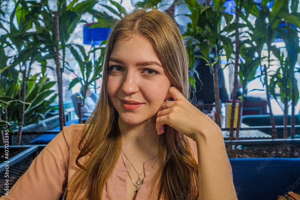 Blond haired woman smile in cafeteria