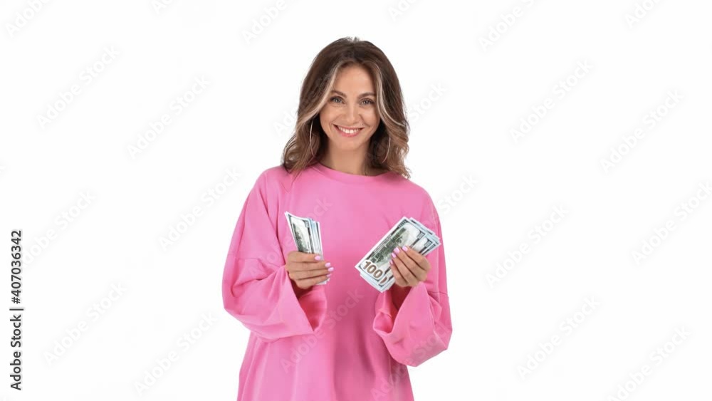 Woman counting cash dollar money payment lottery win or salary isolated. Shot with RED camera in 4K