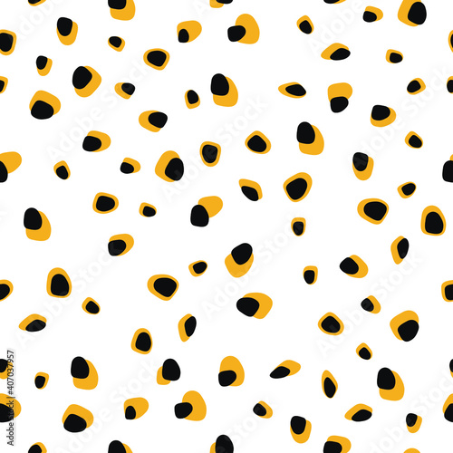 Trendy seamless pattern of yellow brown leopard spots for holiday wrapping paper, fabric, textile, bedding, bedspread. Vector illustration.