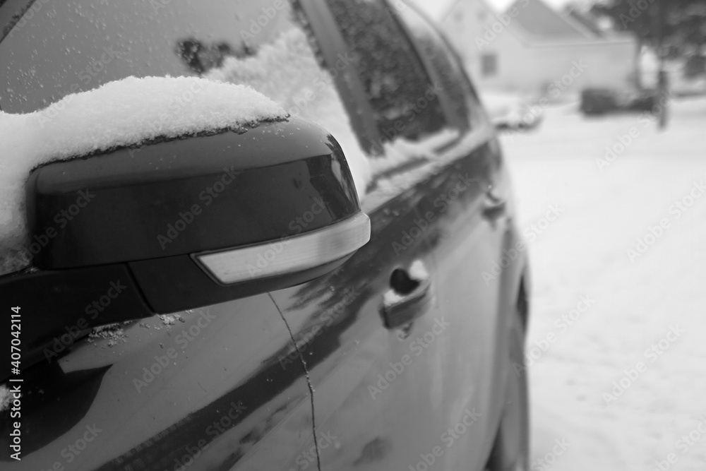 snow on car in freezing condition in winter stock photo