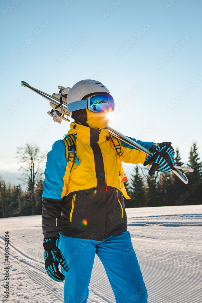 portrait of woman skier on the hill