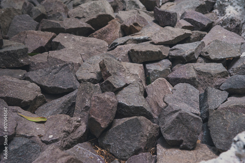 Background of rock wall made of stone