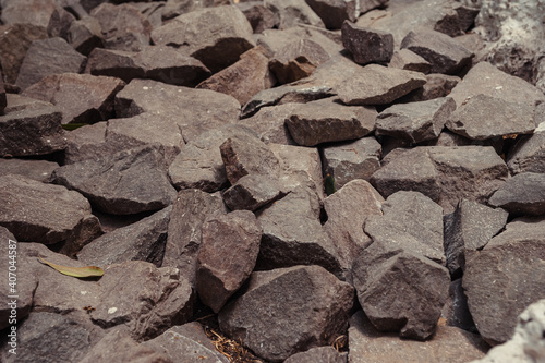 Background of rock wall made of stone