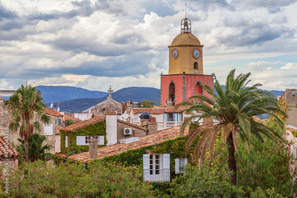 Saint Tropez, French Riviera, France. Famous Bell tower and authentic houses of the old town.