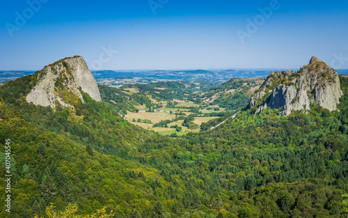 Famous viewpoint in Auvergne on two volcanic boulders Roches Tuilières and Sanadoire photo