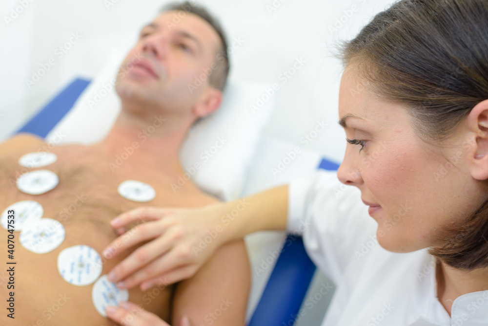 a nurse putting the patches a nurse putting the patches
