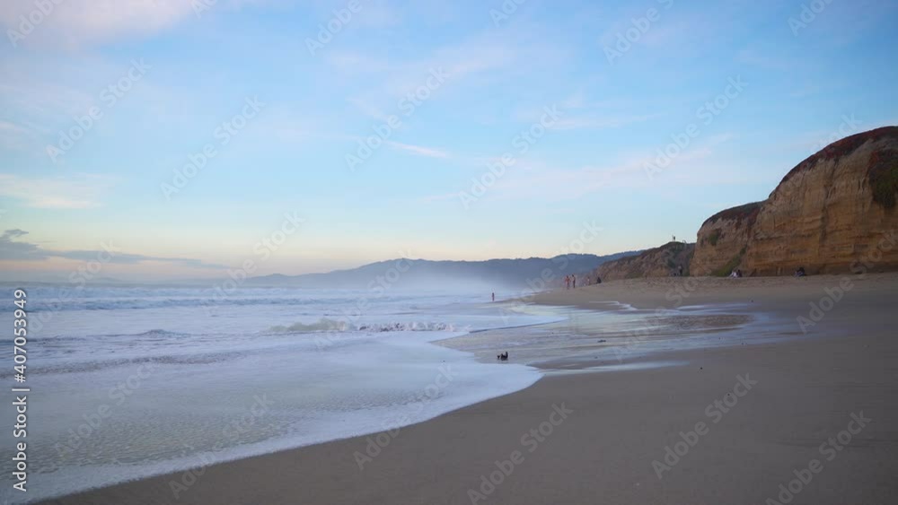 Twilight, waves, and cliffs in Half Moon Bay, California. Twilight, waves, and cliffs in Half Moon Bay, California.