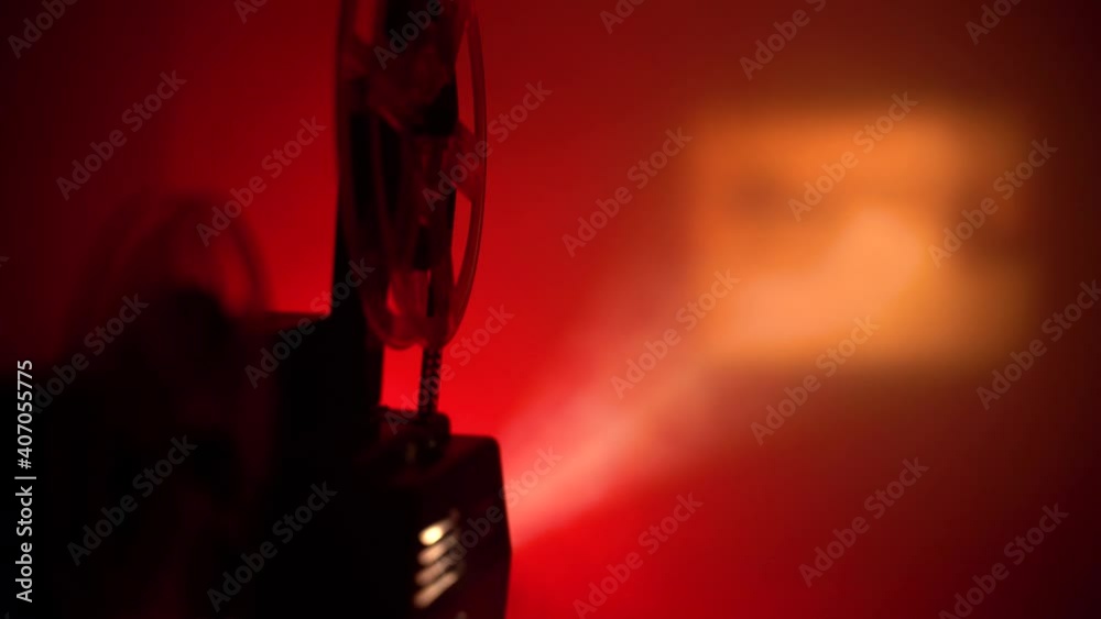 super 8 camera film projector, cinematography red light and smoke
