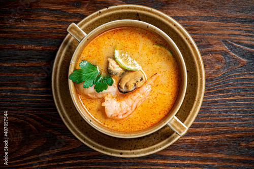 seafood soup on the wooden background