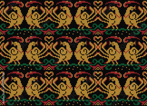 Seamless knitted pattern: golden bird on a green branch on a black background.