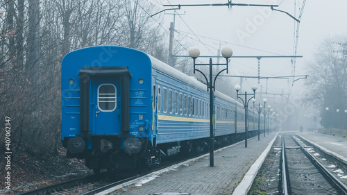 Truskavets, Ukraine - December 2020: Electric freight train awaiting departure on the platform of the railway station.  Ukrzaliznytsia. Ukrainian railways. photo