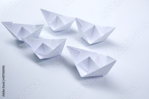 paper boats on the white