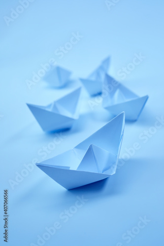 paper boats on the white
