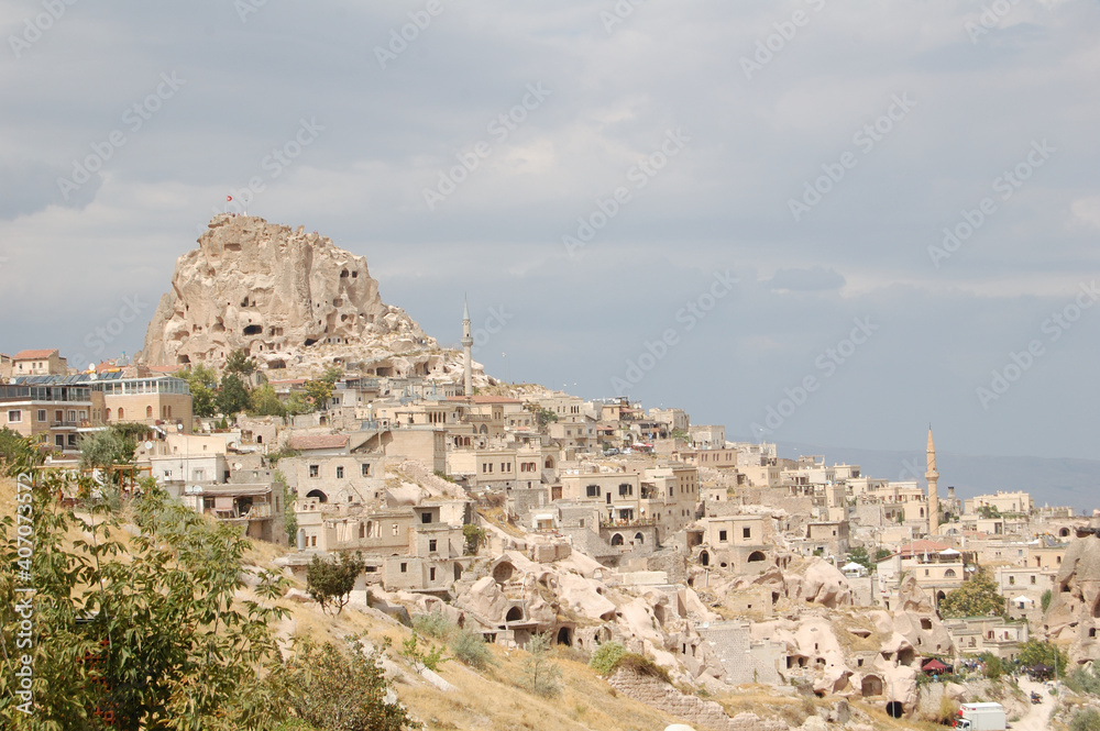 Ancient troglodyte village of Uchisar, in Cappadocia (Central Anatolia, Turkey). Fairy chimneys
