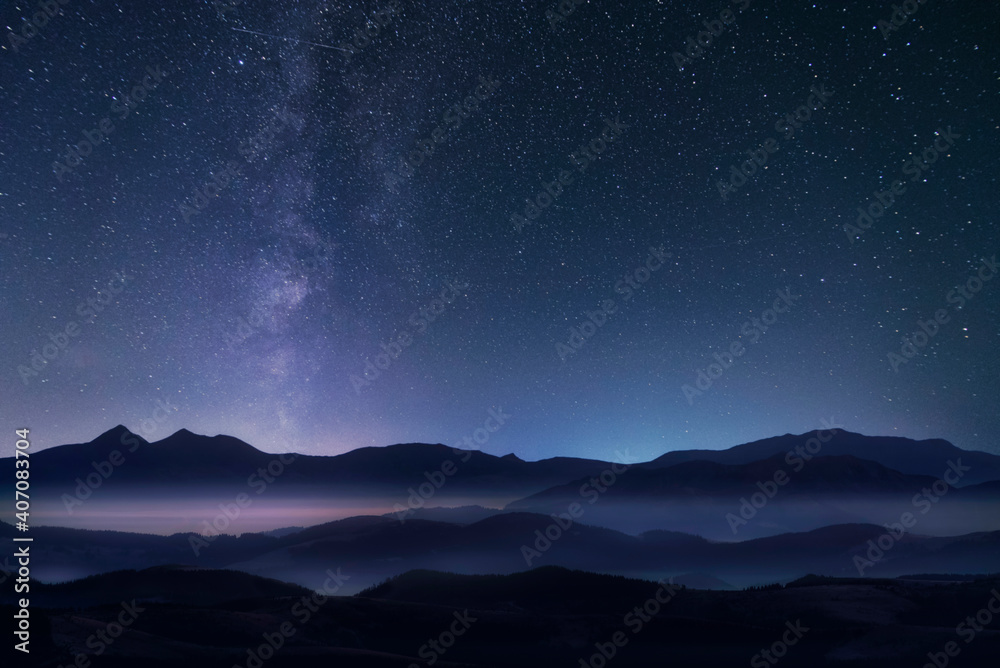 Mountains and milky way in the starry sky.