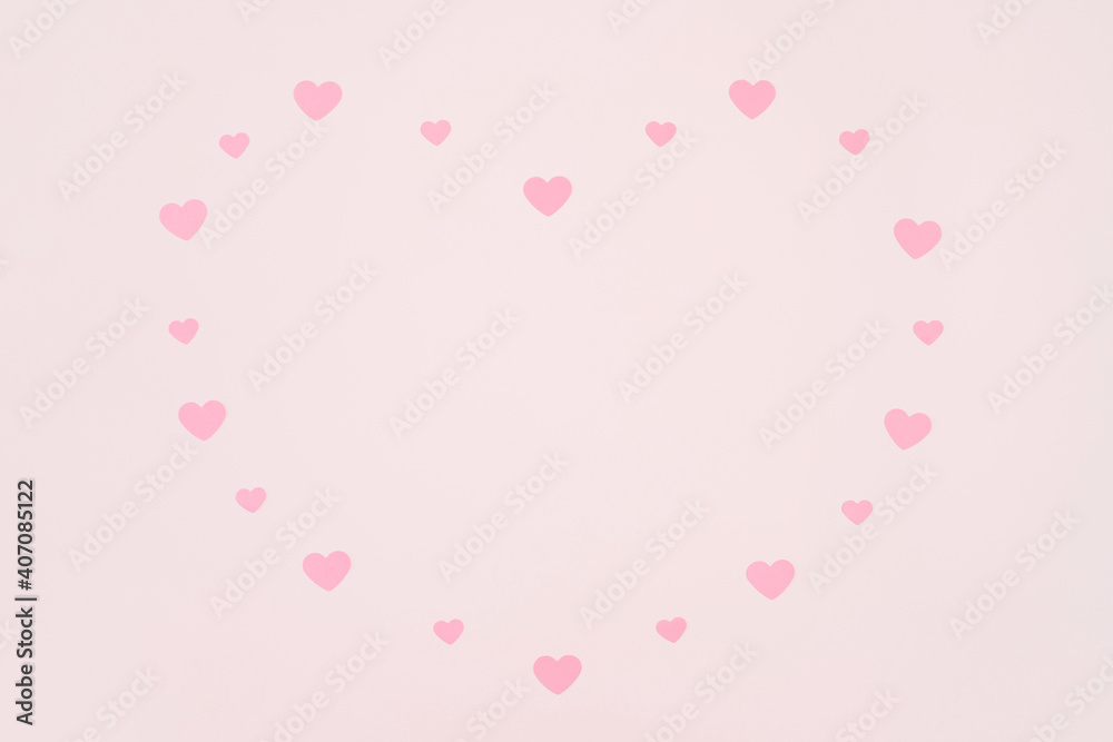Valentine's day background. Romantic composition with small pink confetti hearts. Valentines day, mothers day, birthday greeting card. Copy space, top view