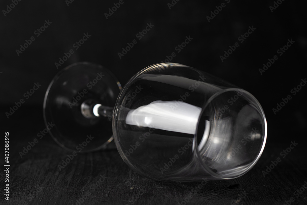 shape of wine glass folded on black background