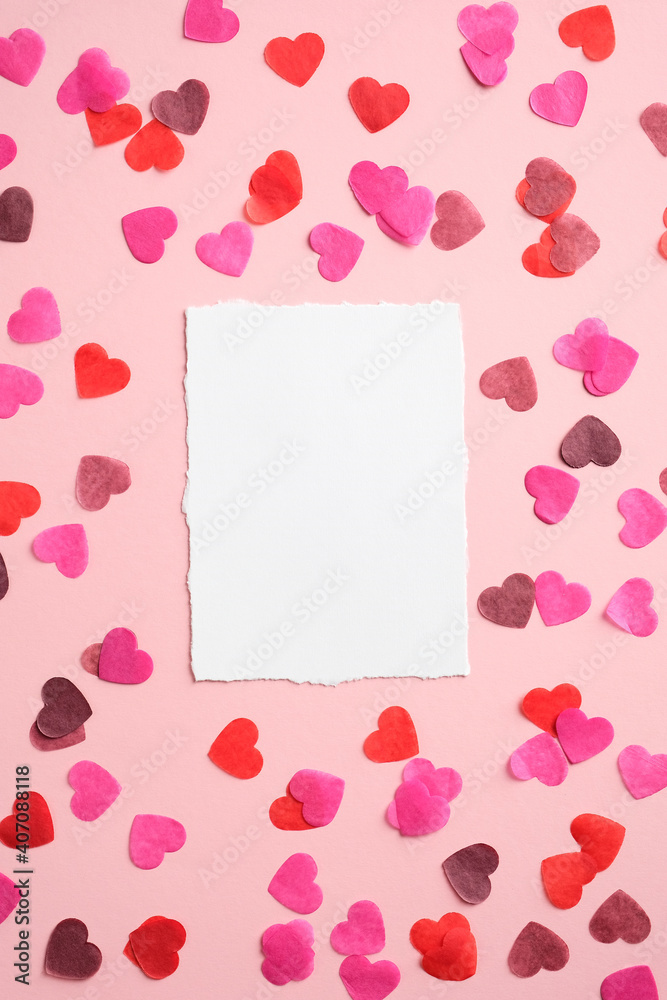 Blank paper card mockup and hearts on pink background. Happy Valentines Day greeting card template.
