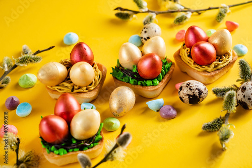 Easter pastries on the yellow background