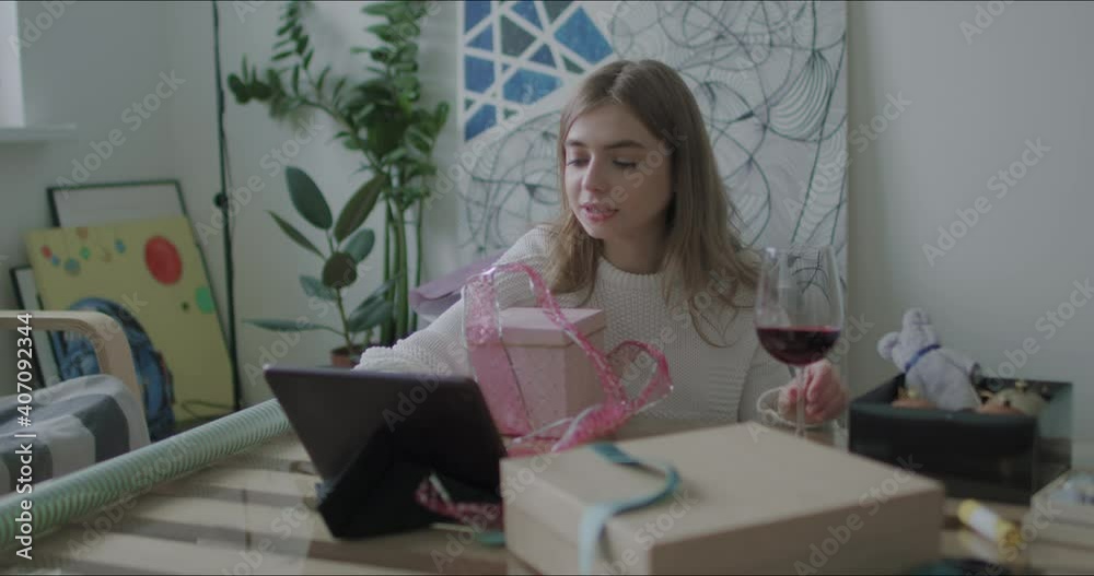 Woman wrapping Christmas presents gift Woman wrapping Christmas presents gift
