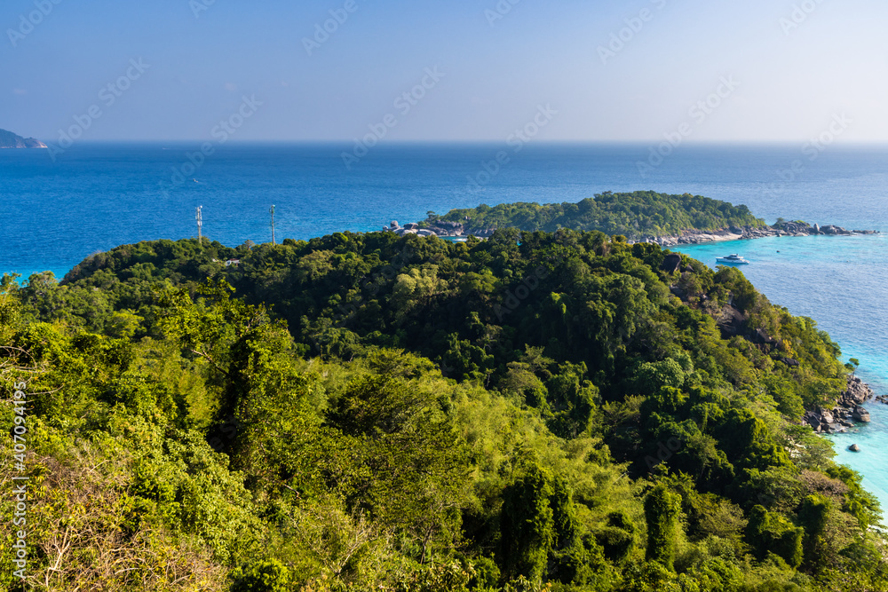 Beautiful tropical island surrounded  by clear, warm ocean and coral reef (Similan Islands)