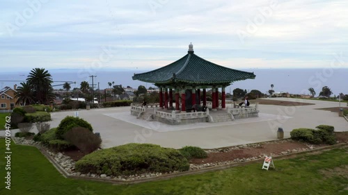 Aerial: Traditional Asian building, Korean Friendship Bell in Los Angeles California, drone view 01