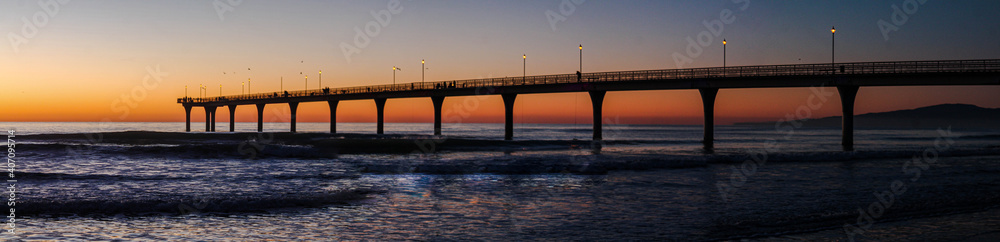 panoramic sunrise at pier