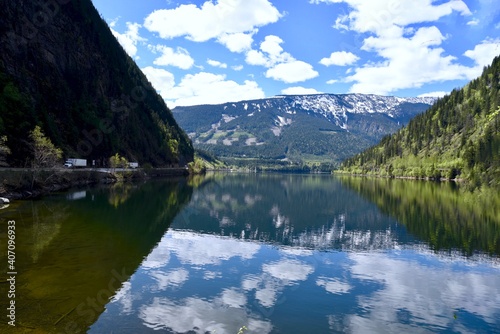 reflection of clouds on the water at three gap junction in the Canadian rockies