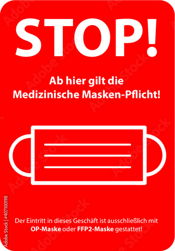 Rotes STOP Hinweis Schild für die medizinische Masken-Pflicht in Geschäften