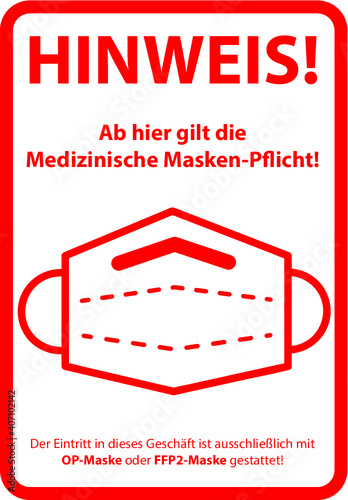 Rotes STOP Hinweis Schild für die medizinische Masken-Pflicht in Geschäften