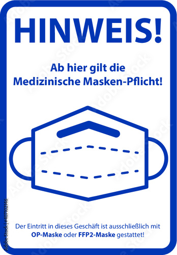Blaues STOP Hinweis Schild für die medizinische Masken-Pflicht in Geschäften