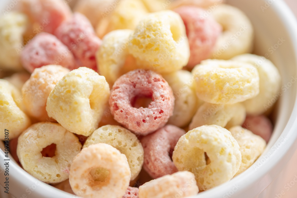 Close-up of cereal flakes food back ground.Food with delicious fruity taste and fruity colours.It's made with maize,wheat,and barley.