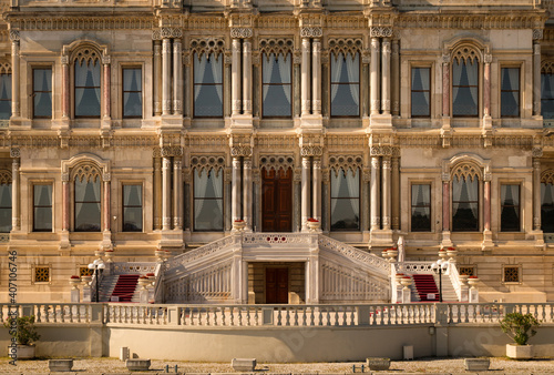 View from the waters of Bosporus Strait on the main building of glamorous Ciragan Palace, a historic ornate Ottoman sultan palace in Besiktas district of Istanbul photo