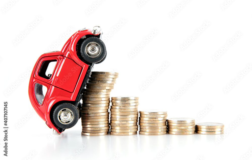 A row of euro coins on a white background and a red climbing car model