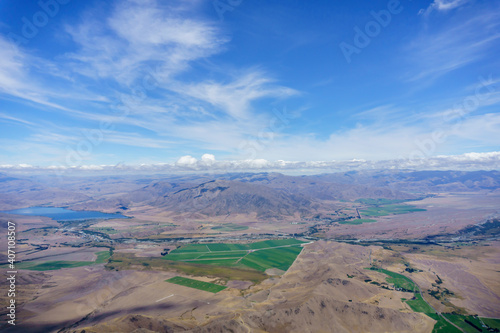 Aerial view of Canterbury landscape through perspex canopy from within glider cockpit in flight.