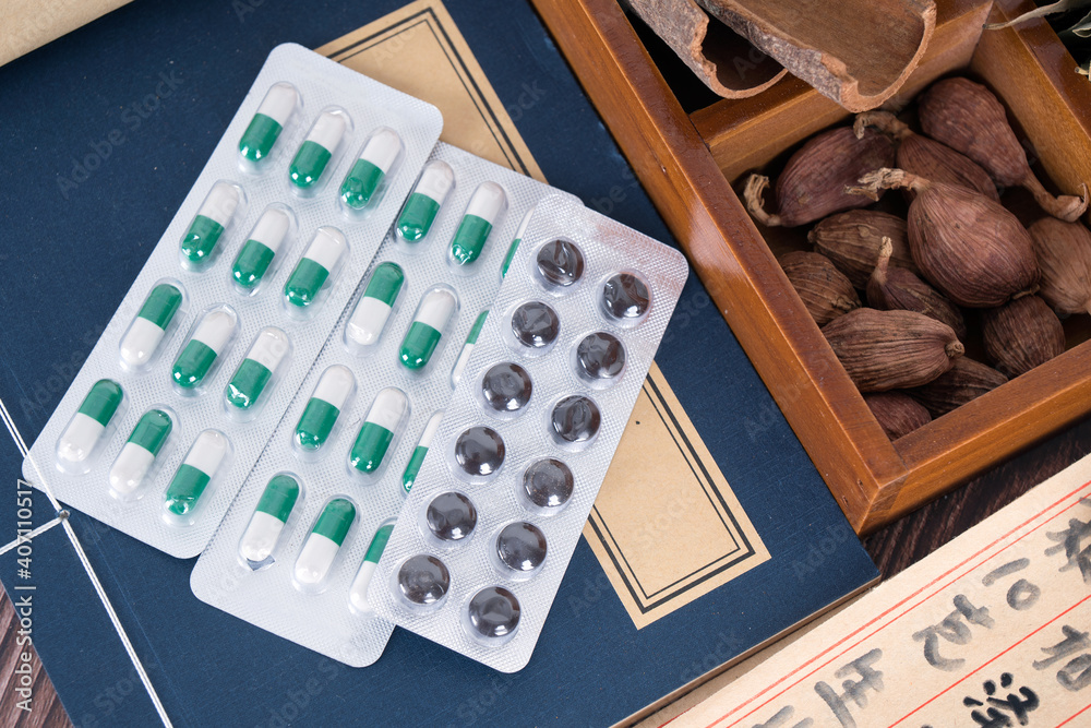 Looking down on Chinese medicine and Western medicine in still life Looking down on Chinese medicine and Western medicine in still life