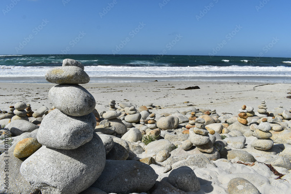 Stacked rocks on a beach along the 17 mile drive in Monterey, California.