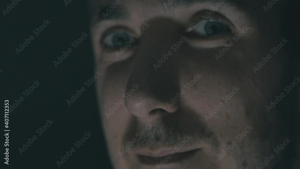 Caucasian Man Looking With Expressive Eyes In Dark Background. - Close Up Caucasian Man Looking With Expressive Eyes In Dark Background. - Close Up
