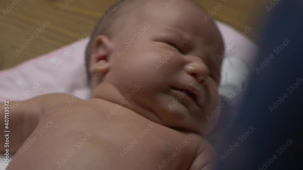 Neonate Crying While Lying On Baby Blanket. - close up, slow motion Neonate Crying While Lying On Baby Blanket. - close up, slow motion