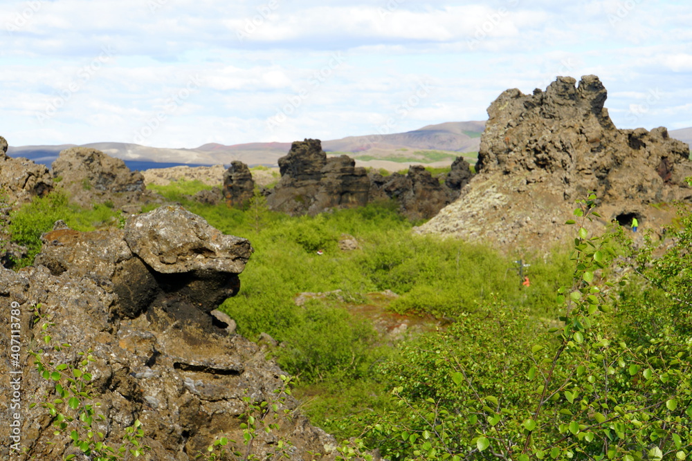 The view of the unique rock structure at Dimmuborgir Lava Formations near Lake Myvatn, Iceland in the summer