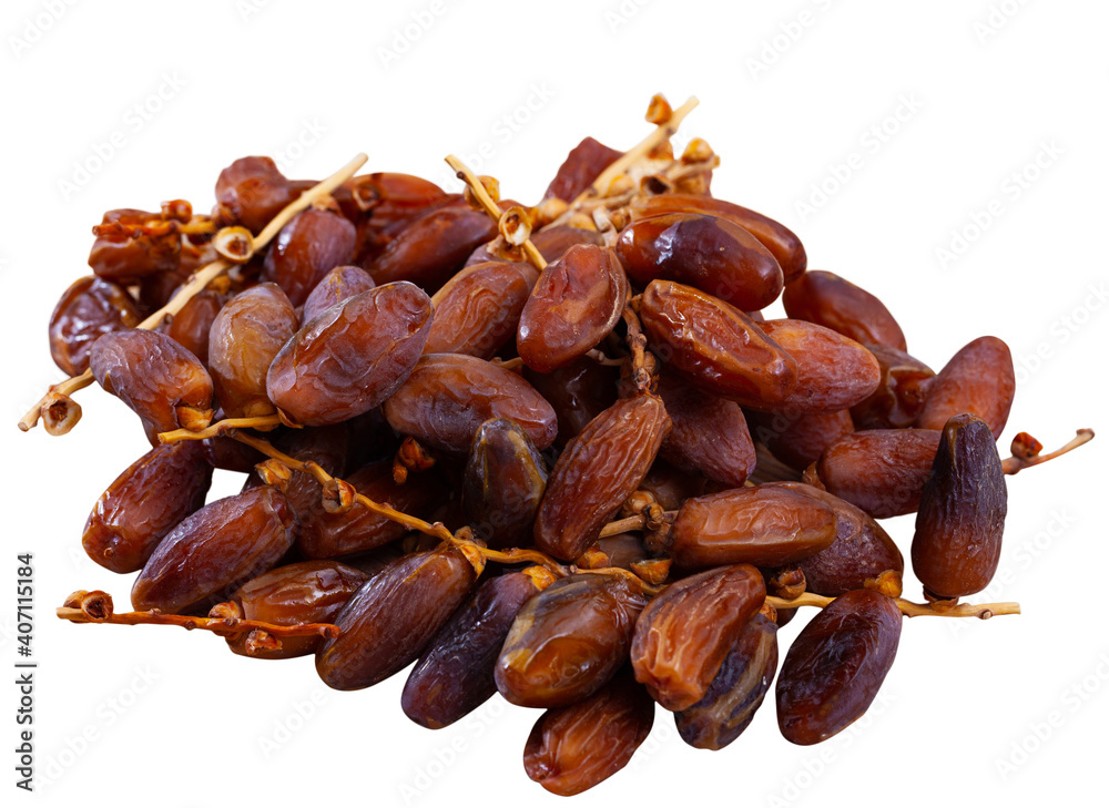 Obraz premium Pile of sweet dates, popular healthy sweet food. Isolated over white background