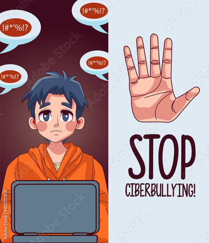 young teenager boy using laptop with stop cyber bullying lettering