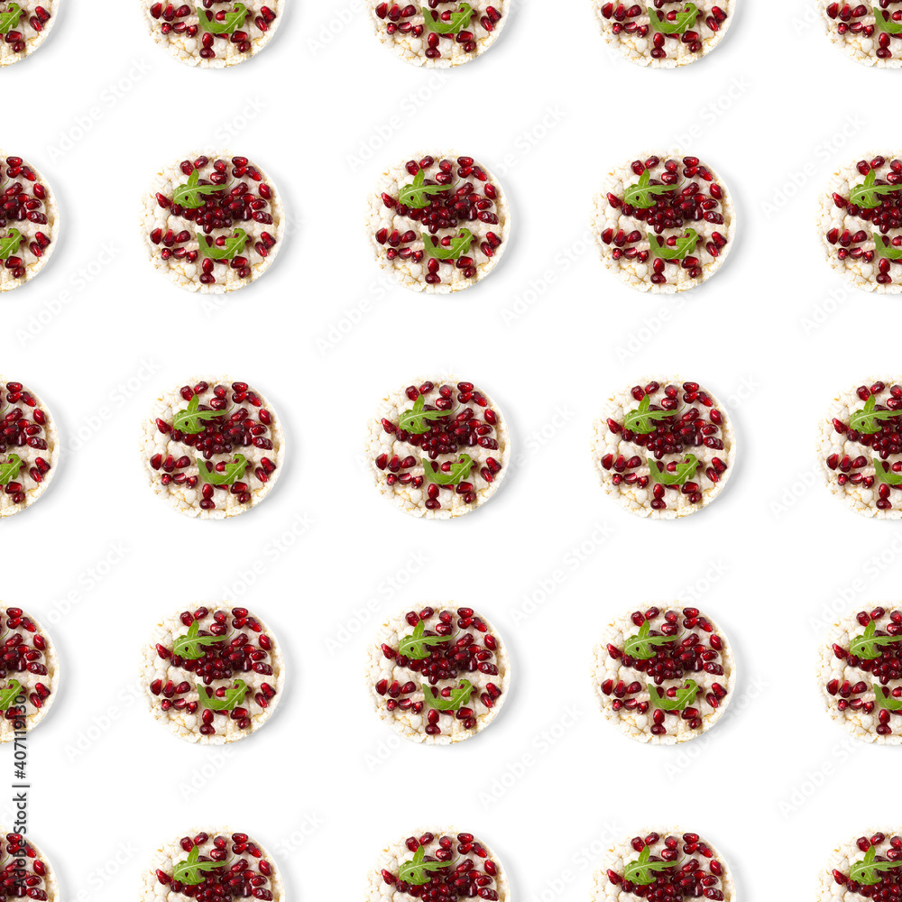 Seamless pattern from galettHealthy breakfast with rice cake and pomegranate on white flat lay Seamless pattern from galettHealthy breakfast with rice cake and pomegranate on white flat lay