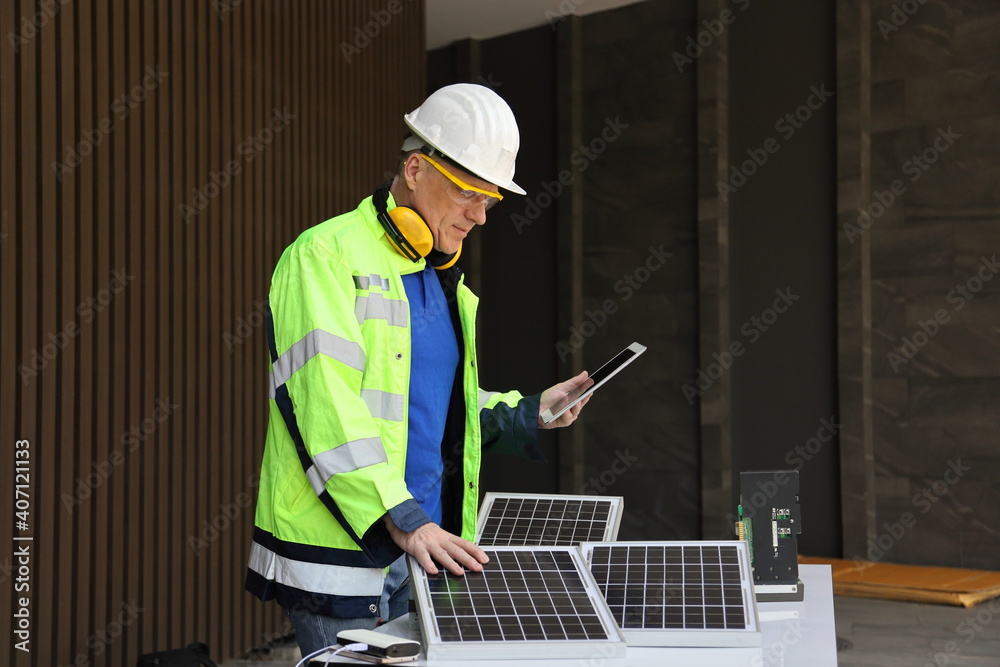 Caucasian engineer is working on setting up solar panel circuit for sustainable energy resource with copy space for industrial usage Caucasian engineer is working on setting up solar panel circuit for sustainable energy resource with copy space for industrial usage