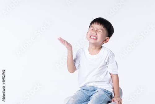 Asian boy hurting or hit himself with his palm