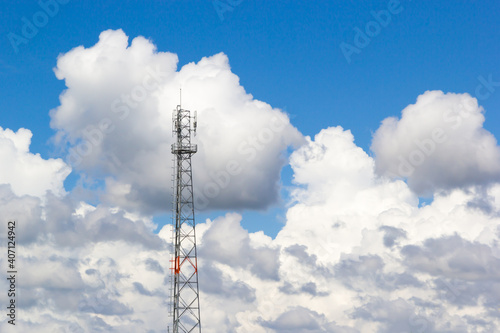 Telecommumication pole see cloud and blue sky background photo