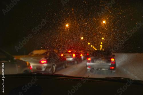 Cars in traffic in winter in the evening dark © pro2audio