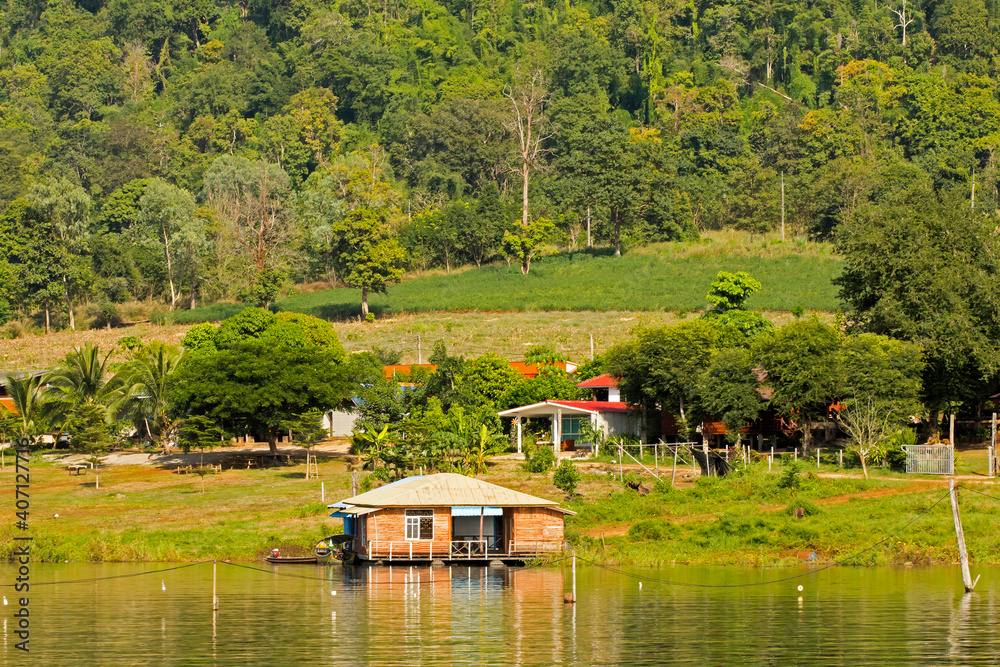 Boat house in the dam, surfers, rest and fishing